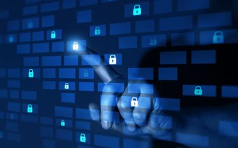 Hand pointing at digital padlocks on a blue virtual interface. Hand pointing at digital padlocks on a blue virtual interface.